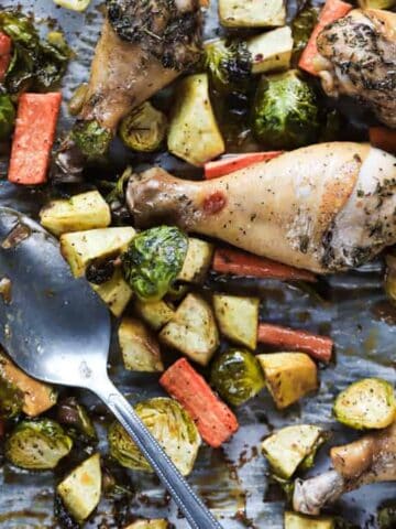 A sheet pan of roasted chicken and root vegetables