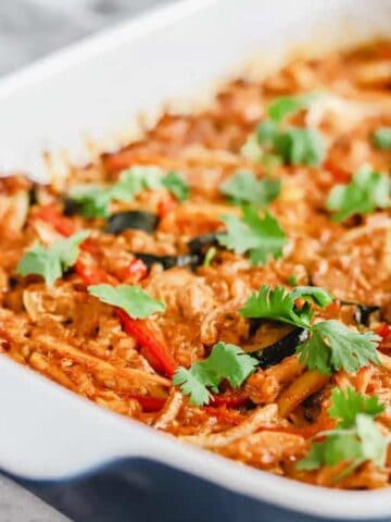 Chicken Fajita Casserole in a blue casserole dish